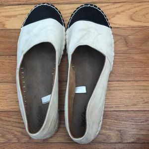 Tan and black espadrilles